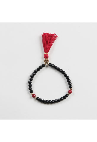 The Mastermind Black Onyx w/ Red Tassel Bracelet